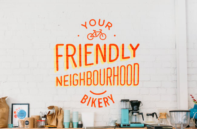 A sign behind the counter.