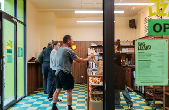 Customers getting their orders at Big Lizard.