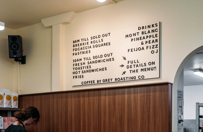 Menu on the wall at Big Lizard.