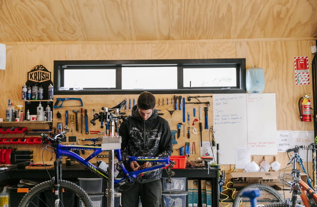 Man fixing a bike.