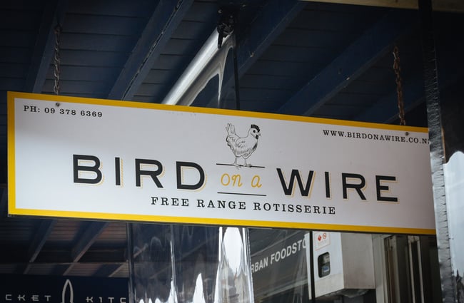 Entrance sign for Bird on a Wire.