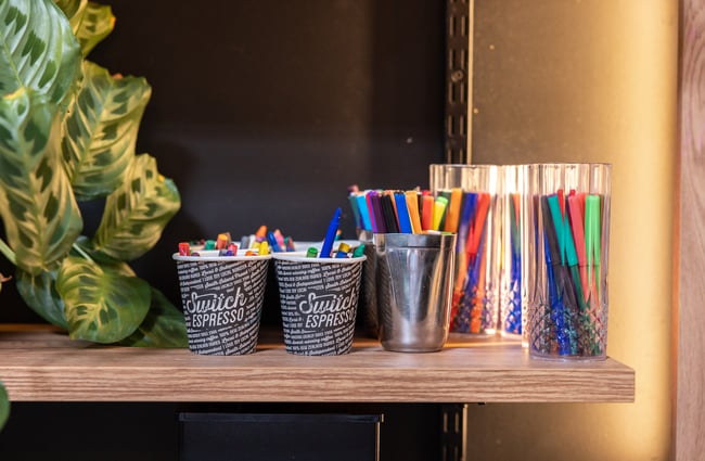 Colouring in supplies sit on the shelf at Black Betty.