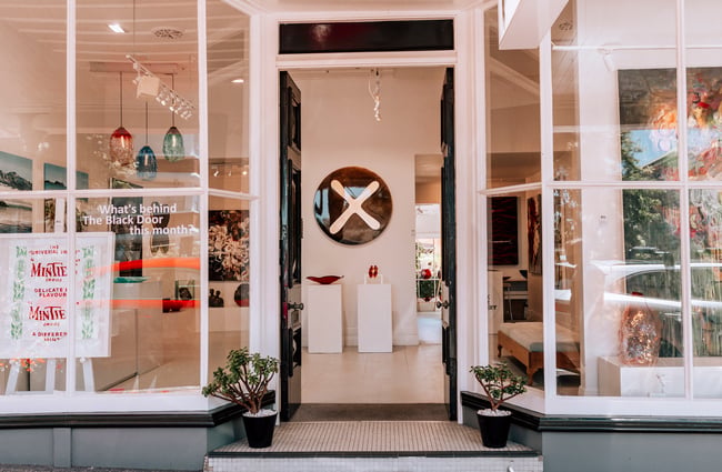 Look through the doorway to inside Black Door Gallery, Auckland.
