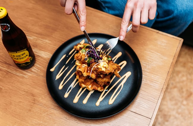 A close up of a plate of fritters.
