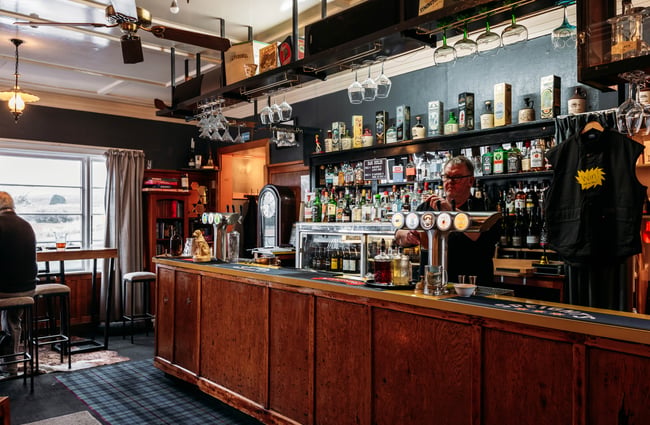 The bar counter inside Blacks Hotel.