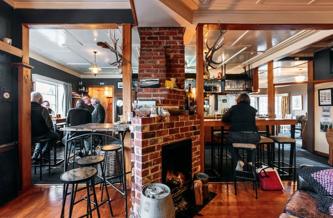 People dining inside a Central Otago pub.
