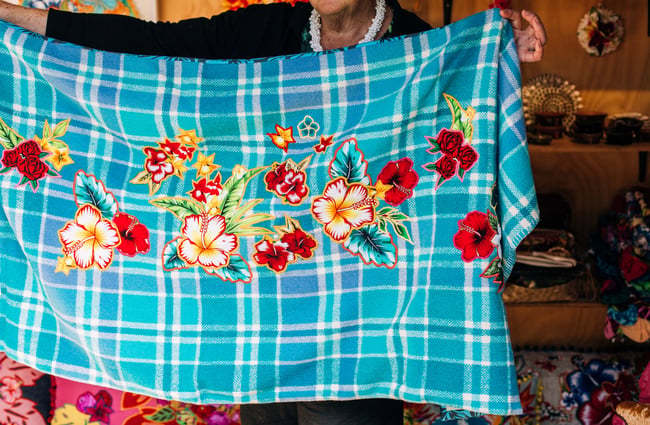 Flower embroidery on a gingham blanket from Blue Bell Club, Porirua.