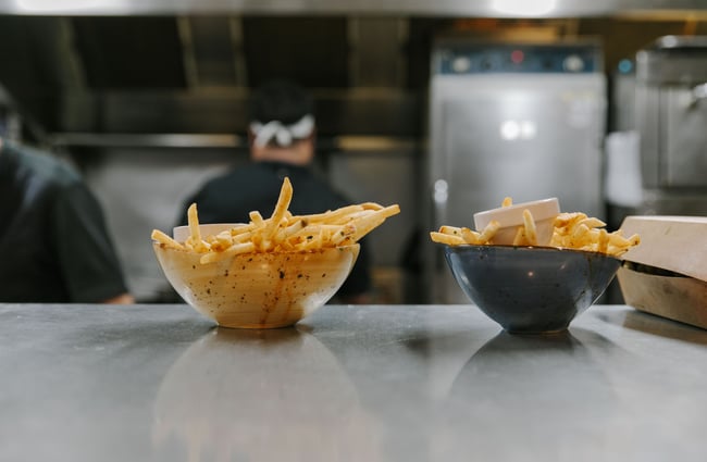 Bowls of fries on the pass at Blue Lake Eatery and Bar, Tekapo.