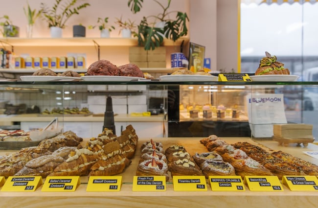Pastries and other baked goods in the cabinet at Blue Moon Bakehouse.