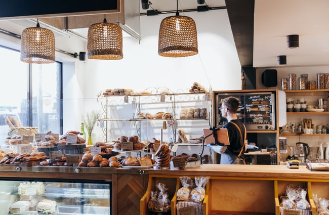 Wooden counter and trays of baked goods at Bohemian Bakery in Christchurch's central city.