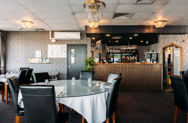 The black interior of a restaurant in Gisborne.