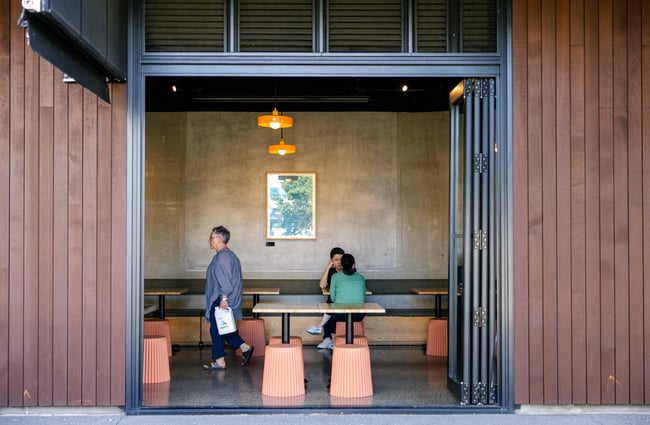 View of customers sitting at Bowler.
