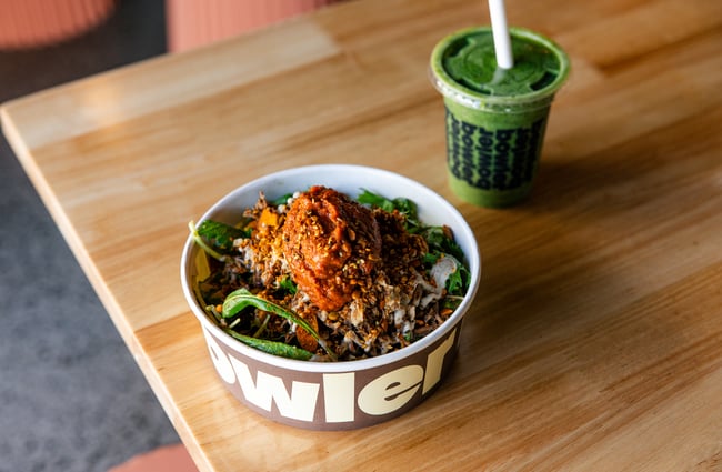 Bowl and smoothie on the table at Bowler.