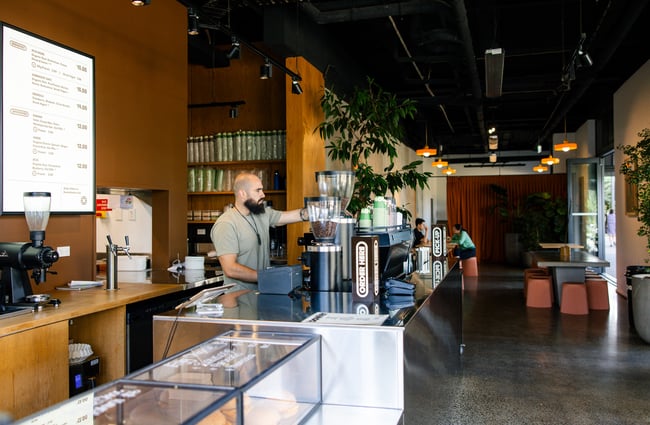 Barista behind the machine at Bowler.
