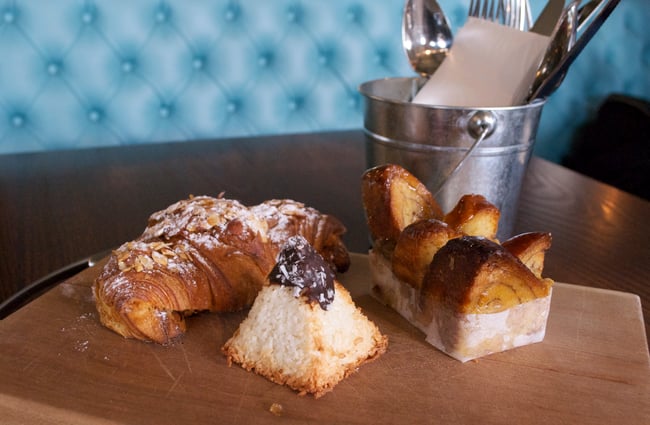 Baking on a wooden board against a blue wall.