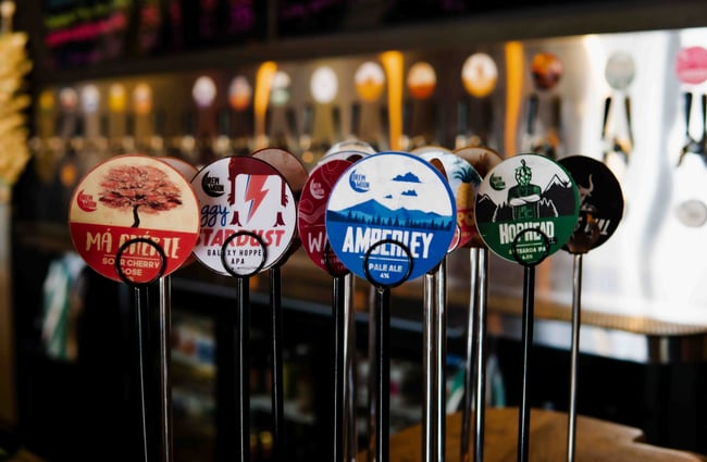 Table numbers in the form of beer labels at Brew Moon.