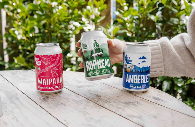 Three different Brew Moon beers in colourful cans.