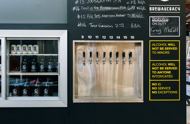 The taps and fridge at Brewaucracy, Hamilton.