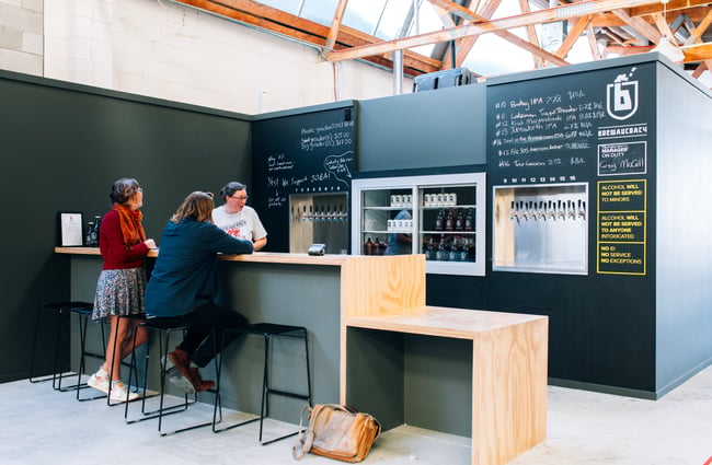 Two customers at Brewaucracy, Hamilton.