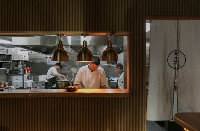 Chefs working in a ktichen.