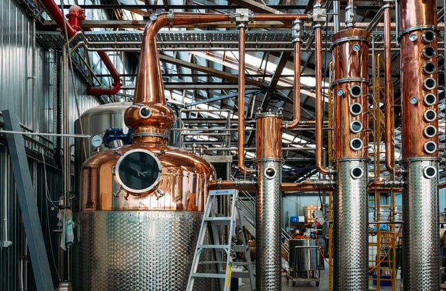 Large brewery equipment inside a brewery.