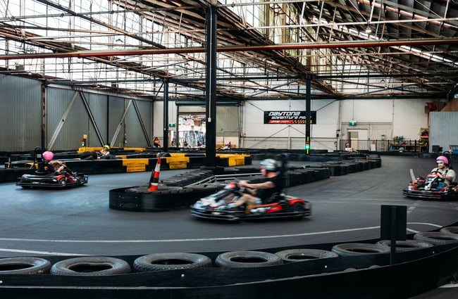 Go carts on a race track.