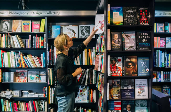 A woman looking at a book.
