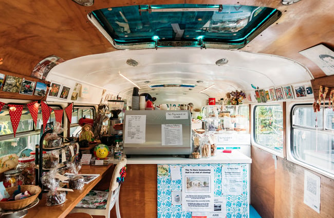 A coffee machine inside a bus cafe.