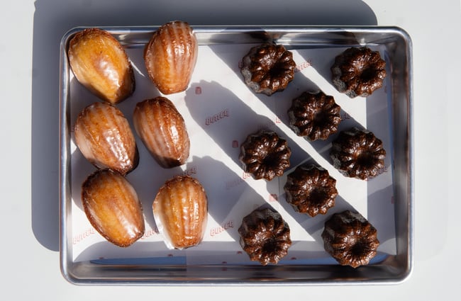 A flatlay of pastries on a tray.