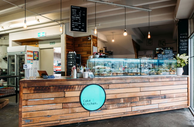 The large wooden cafe counter at Cake & Kitchen in Upper Hutt.