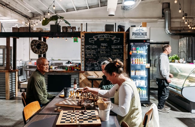 Customers playing games of chess at Cambridge Lane.