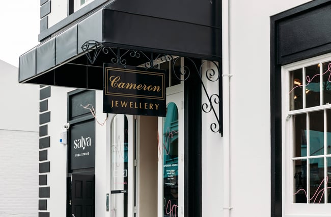 Signage and front door of Cameron Jewellery.