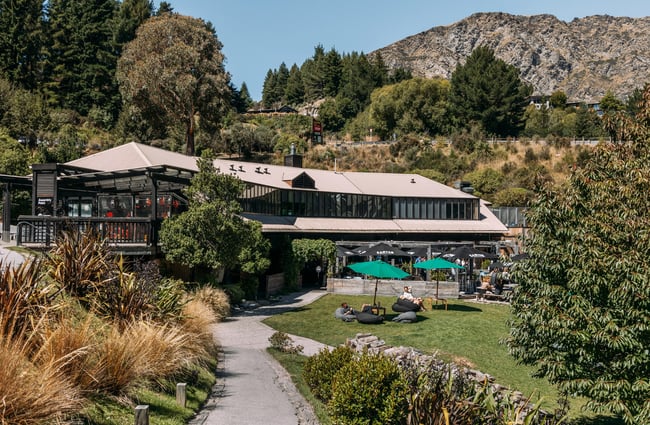 The large exterior of Canyon Brewing Queenstown on a sunny day.