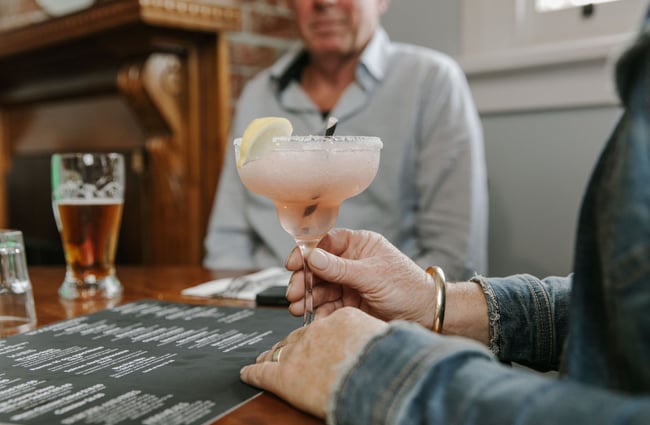 Close up of pale pink cocktail at Carnegie's Restaurant and Bar, Fairlie.