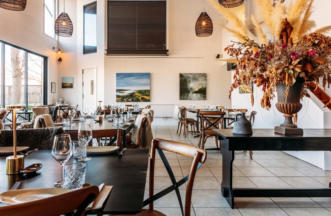 The vast interior of a winery restaurant.