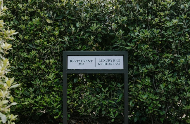 Exterior signage for restaurant and B&B.