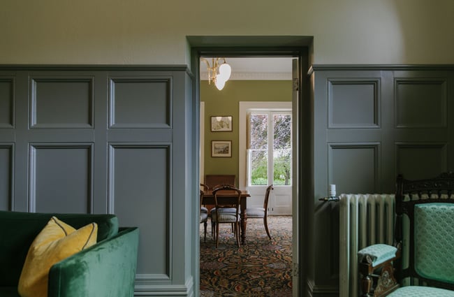 A close up of the dining room through doors at Casa Nova.
