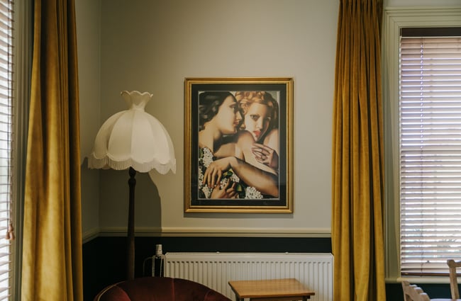 A painting on wall inside a beautifully directed Casa Nova restaurant.