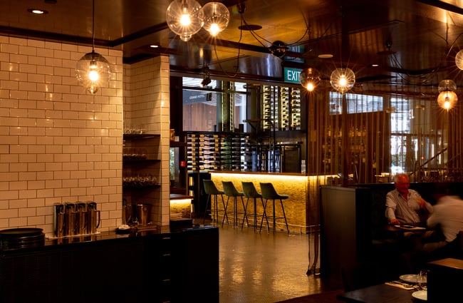 A view of the bar from the dining room.