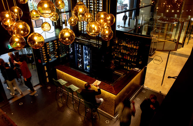 Looking down at the bar from a mezzanine floor.