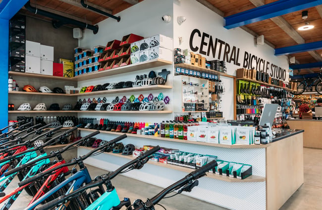 Front counter at Central Bicycle Studio and bikes surrounding it.