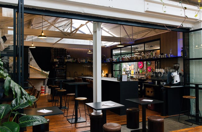 Dining space and bar area at Ciao within The Welder.