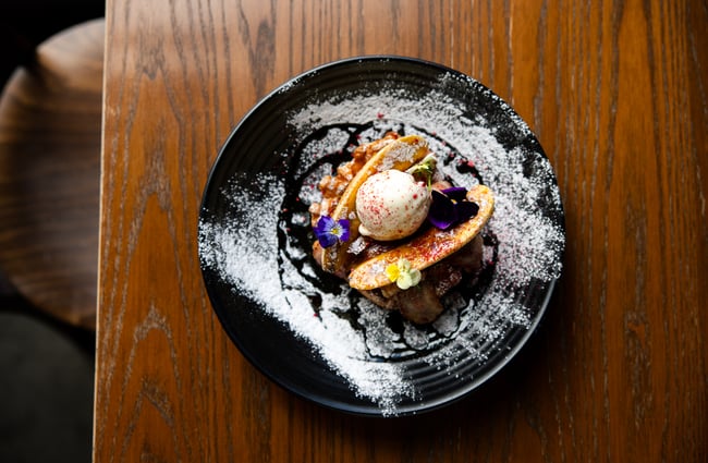 A close up of a dessert on a table.