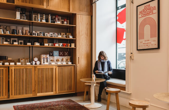 Customer reads a journal at Coffee Supreme Midland Park, Wellington.