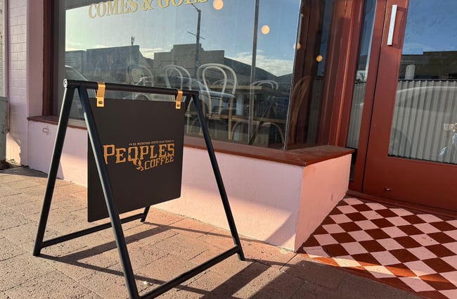 Peoples Coffee footpath sign outside Comes & Goes café in Petone.