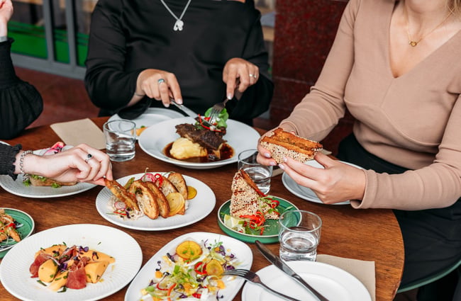 Table full of food at Commons Eatery.
