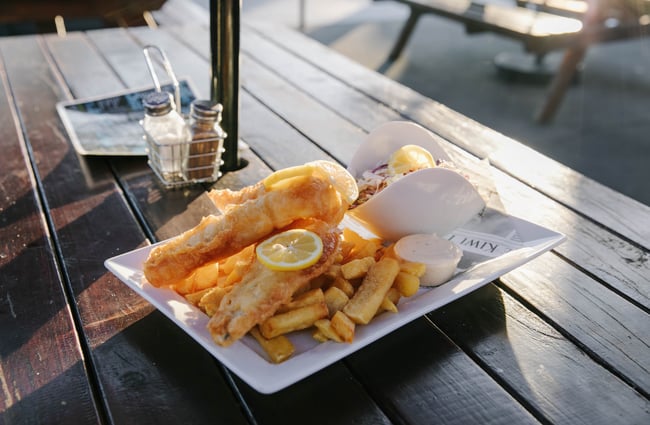 Fish and chips on a plate.