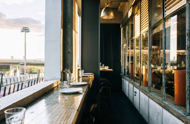 Outdoor balcony dining at Otto, Auckland.