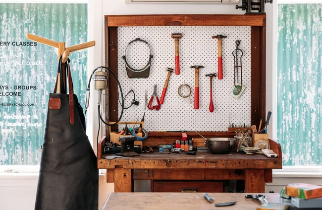A close up of tools on display in a workshop.