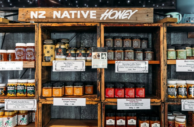 Jars of honey on display for sale.